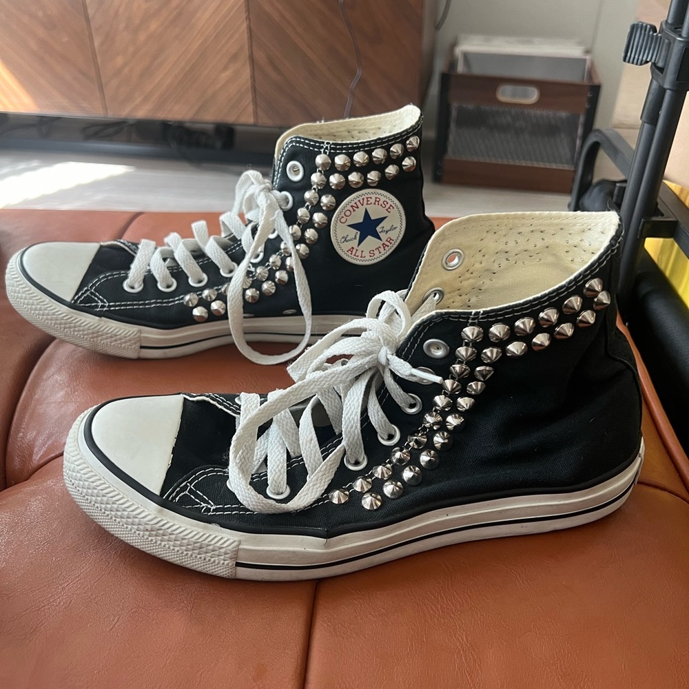 Silver studded black converse hi top